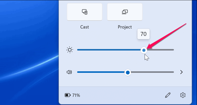 Drag the brightness slider to the left or right.
